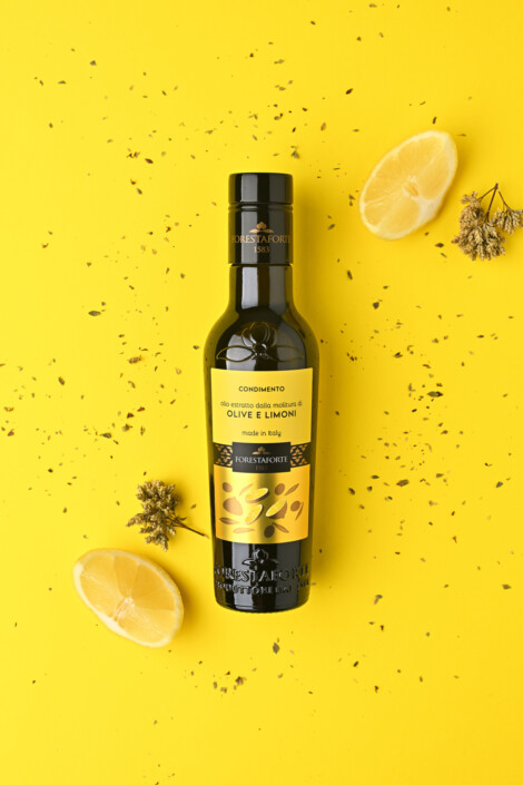 Fotografia pubblicitaria olio extravergine di oliva aromatizzato