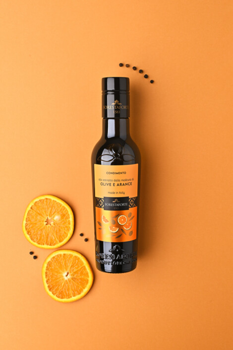 Fotografia pubblicitaria olio extravergine di oliva aromatizzato